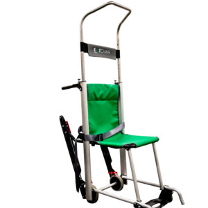 he Exitmaster Versa Plus Evacuation Chair, displaying its green seat, grey frame, four wheels, and distinctive extra mobility handles for enhanced maneuverability.
